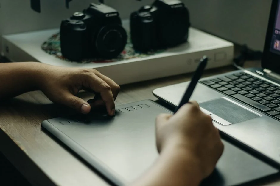 A tablet displaying a financial website, paired with a white keyboard and mouse. Perfect for stock images with a technology theme.